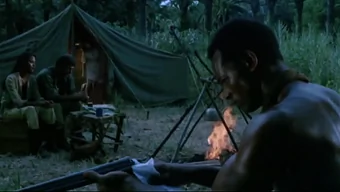 The wife fucks a black man in front of her husband, an intense scene.